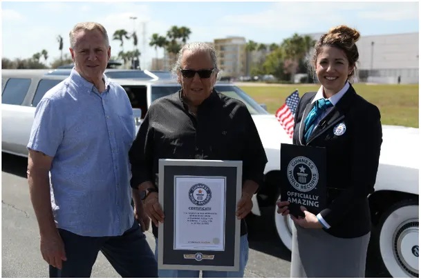 Michael Manning and Michael Dezer accepting Guinness World Records certificate for the worlds longest car_tcm25-694613