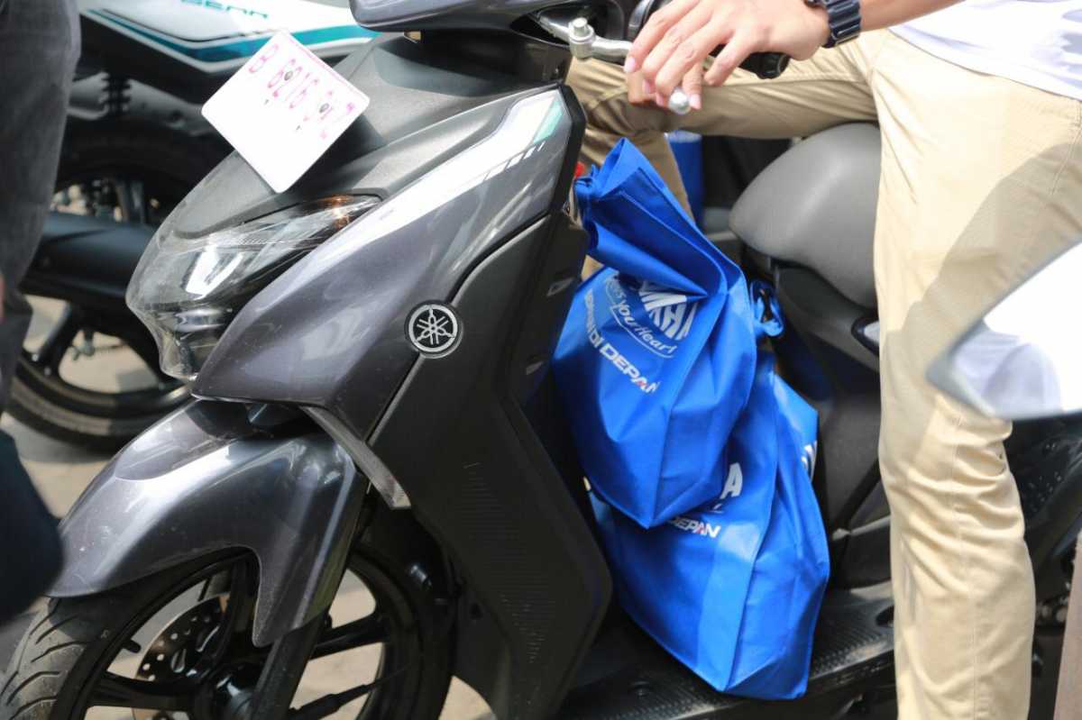Tips Aman Bawa Barang Saat Naik Motor Tips Aman Bawa Barang Saat Naik Motor