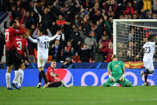 Gol bunuh diri bantu Valencia kalahkan Manchester United Gol bunuh diri bantu Valencia kalahkan Manchester United