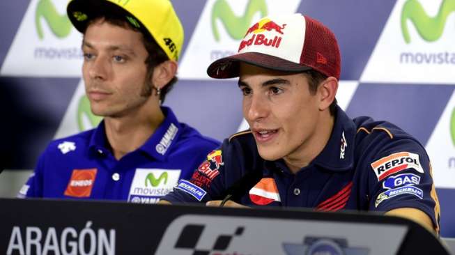 Rebut Start Terdepan, Marquez Asapi Rossi Rebut Start Terdepan, Marquez Asapi Rossi