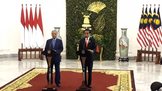 Disopiri Mahathir Ngebut 180 Km/jam, Jokowi Ngaku Tidak Takut Disopiri Mahathir Ngebut 180 Km/jam, Jokowi Ngaku Tidak Takut