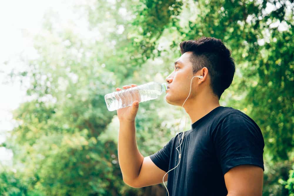 Water you doing. Chinese businessman drinking Water. Take Break Drink Gdanyska.